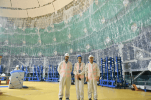 JUNO construction milestone : after the stainless steel structure, half of the acrylic sphere is built